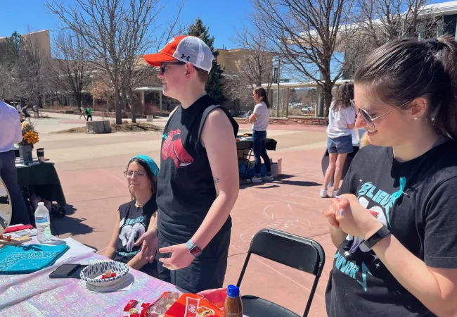 WGAC students outside at a table