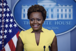 Karine Jean-Pierre behind the podium to lead a White House briefing