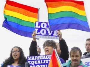 Supporters rally for Social Security benefits for same-sex couples in Springfield, Ill., at a marriage equity event in 2013.